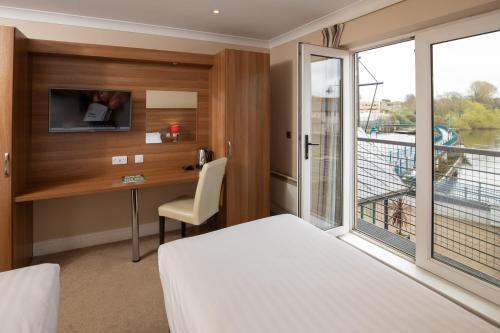 Foto de una habitación de Riverside Hotel