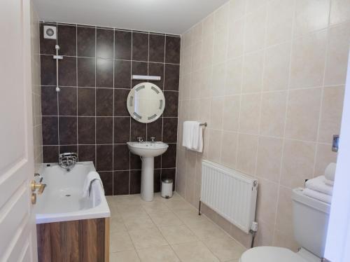 Foto del baño de Ocean Sands Hotel