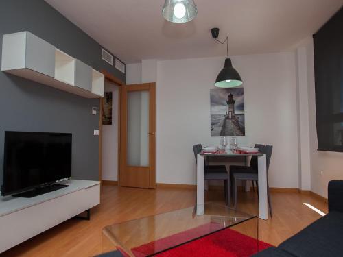 Foto de una habitación de Apartamentos For A Stay Las Dunas