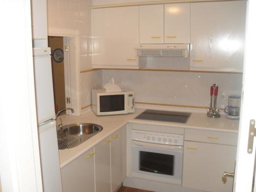 Foto de una habitación de Apartamentos Isla Canela