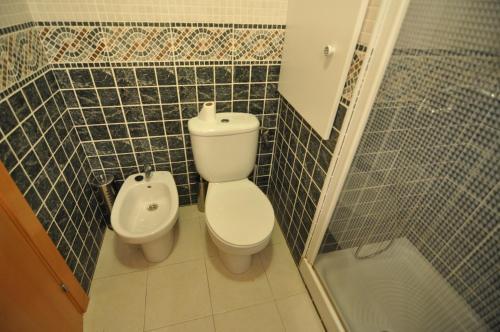 Foto del baño de Apartamentos APCOSTAS - Isla de Rosas