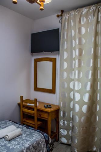Foto de una habitación de HOSTAL VILLARICOS