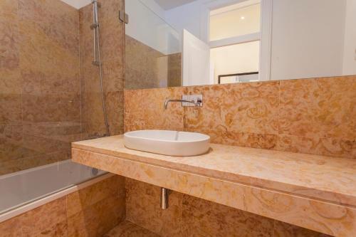 Foto del baño de Apartamentos Casas da Baixa - Jules &amp;amp; Madeleine