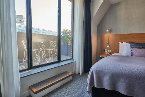 Foto de una habitación de Apex City Of London Hotel