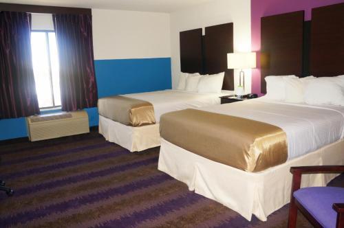 Foto de una habitación de Hotel Quality Inn West End