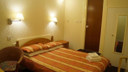 Foto de una habitación de Hampton Court Guesthouse