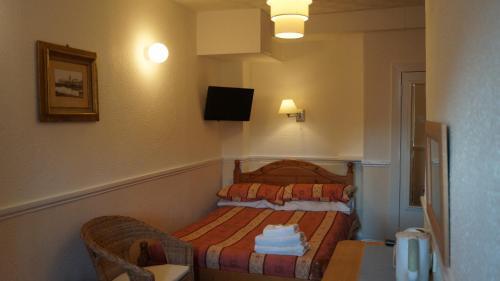 Foto de una habitación de Hampton Court Guesthouse