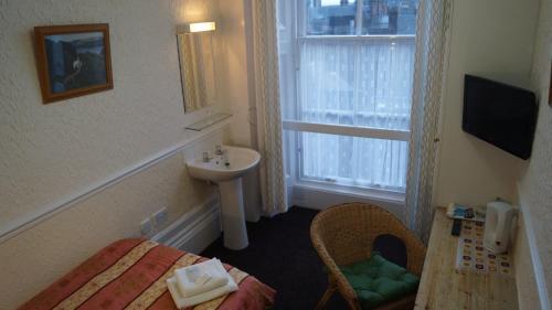 Foto de una habitación de Hampton Court Guesthouse