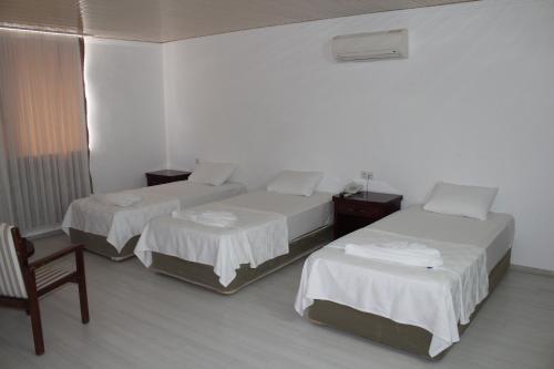 Foto de una habitación de Hotel Gül Otel