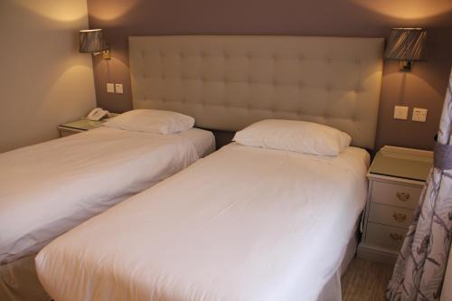 Foto de una habitación de Centennial Hotel