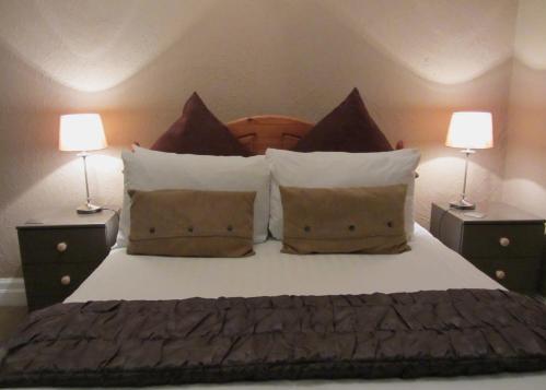 Foto de una habitación de Monties Guest House