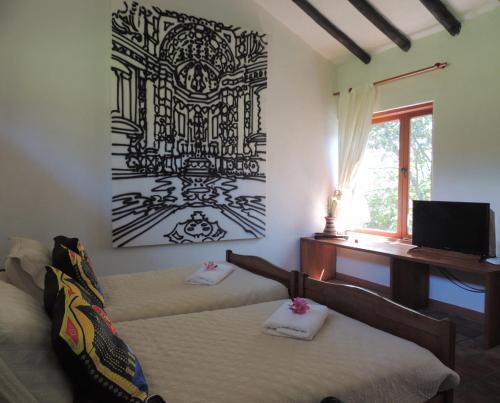 Foto de una habitación de Passadhi Guest House