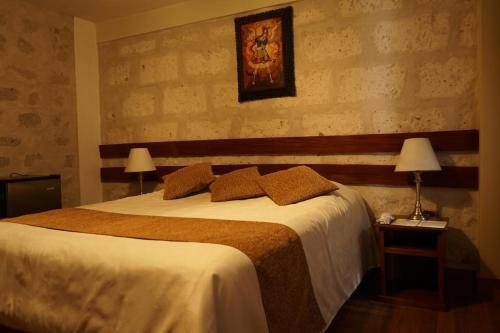 Foto de una habitación de Hotel El Portal De San Lázaro