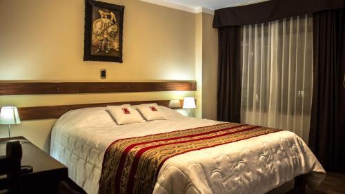 Foto de una habitación de Hotel El Portal De San Lázaro