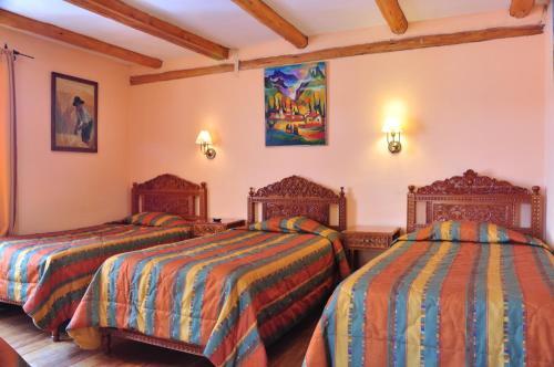 Foto de una habitación de Amaru Inca