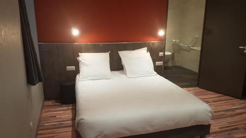 Foto de una habitación de Yseria Hôtel