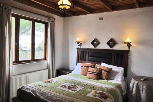 Foto de una habitación de Hotel Hosteria Iloca