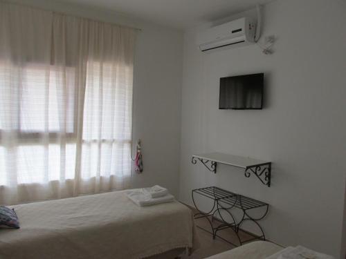 Foto de una habitación de Faro del Parque