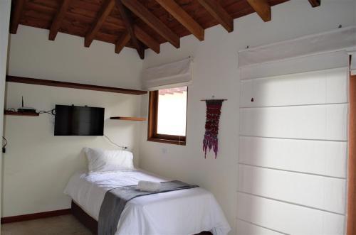 Foto de una habitación de ApartaSuites Las Marías
