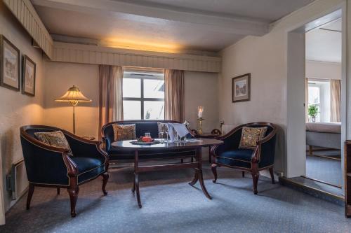 Foto de una habitación de Kronen Gaard Hotel