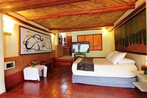 Foto de una habitación de Hotel Suites Arcoiris