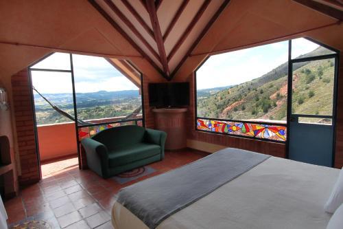 Foto de una habitación de Hotel Suites Arcoiris