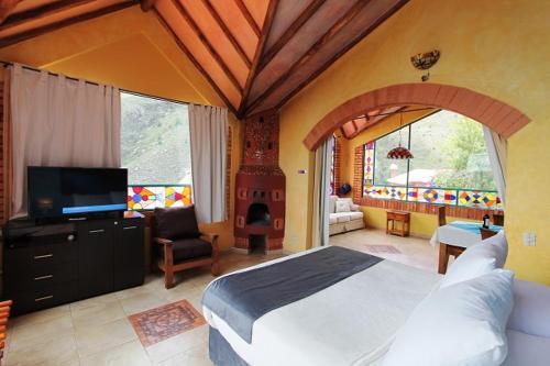 Foto de una habitación de Hotel Suites Arcoiris
