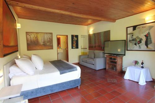 Foto de una habitación de Hotel Suites Arcoiris