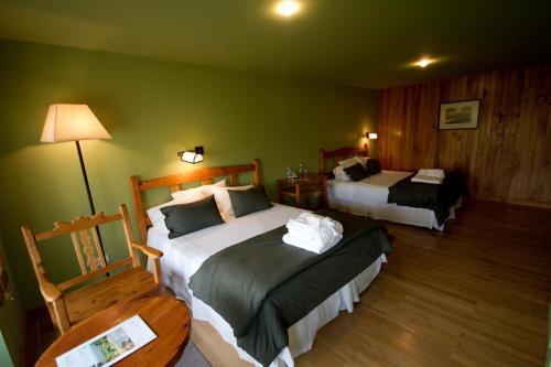 Foto de una habitación de Challhuaquen Lodge