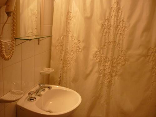 Foto de una habitación de Apart Hotel Alem