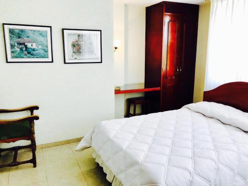 Foto de una habitación de Hotel Azuay