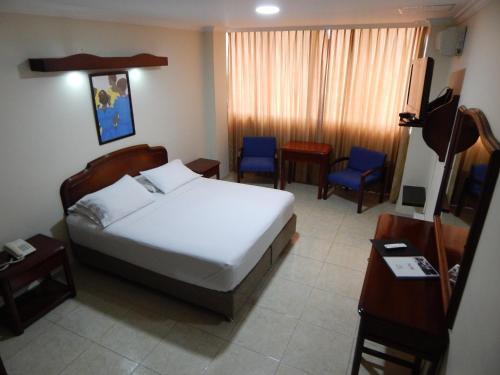 Foto de una habitación de Hotel Maria Gloria