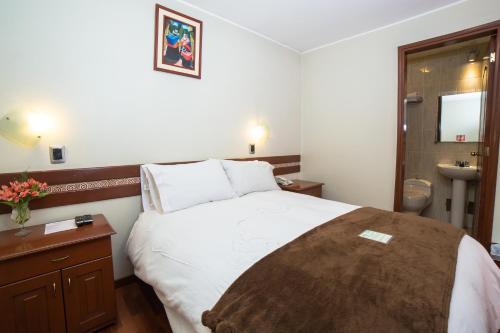 Foto de una habitación de Antawasi Hotel
