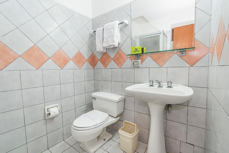 Foto de una habitación de Hotel Ayenda San Isidro Inn
