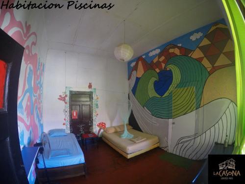 Foto de una habitación de Albergue La Casona de Lobitos