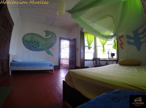 Foto de una habitación de Albergue La Casona de Lobitos
