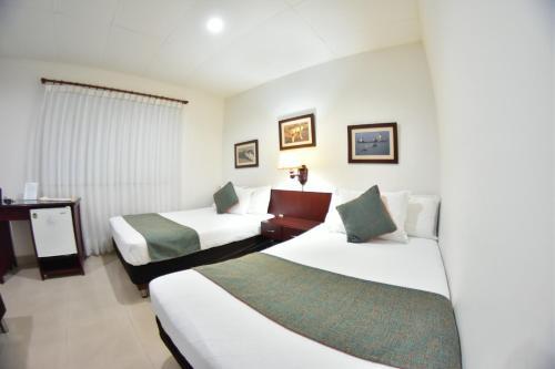Foto de una habitación de Hotel Camoruco