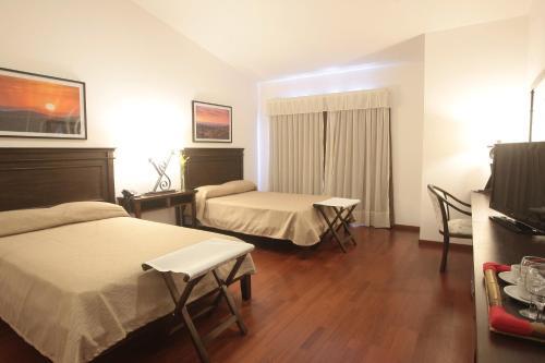 Foto de una habitación de Hotel Nawan Resort Serrano