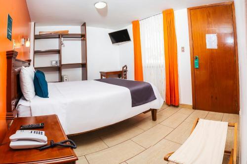 Foto de una habitación de Hotel Ayenda Casona Terrace