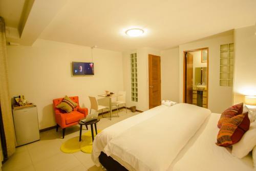 Foto de una habitación de Hotel Wayta Inn