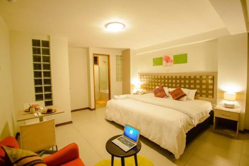 Foto de una habitación de Hotel Wayta Inn