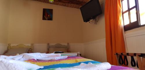 Foto de una habitación de Asqui Pacha Hostel