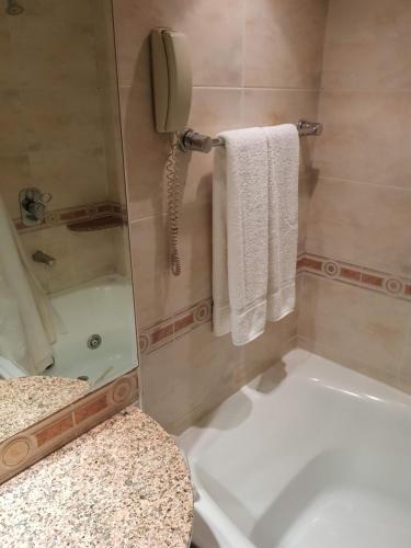 Foto de una habitación de Apartamentos Departamento Céntrico