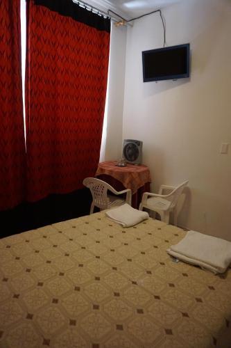 Foto de una habitación de Hostal Camiluz