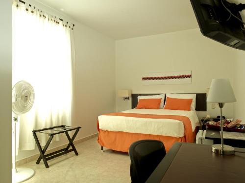 Foto de una habitación de Hotel San Fermin Pereira