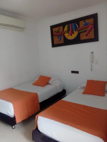 Foto de una habitación de Confort Plaza Hotel