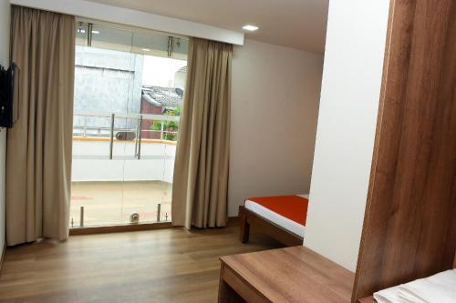 Foto de una habitación de Hotel El Lago 1