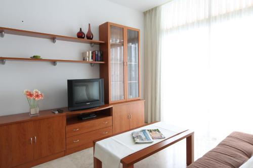 Foto de una habitación de Apartamentos Lido