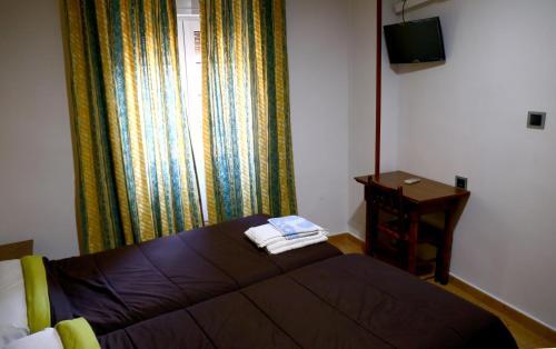 Foto de una habitación de Hostal Muralla