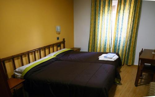 Foto de una habitación de Hostal Muralla